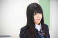 Shinjo nozomi in uniform long hair falling over her shoulders