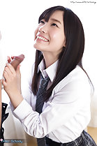 Kasugano Yui on her knees in uniform looking up holding hard cock