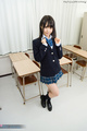 Momoki nozomi in classroom wearing uniform