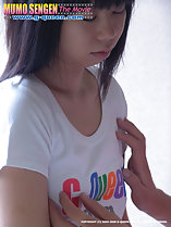 Ran Amami in white tshirt hands on her chest
