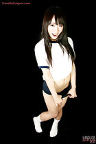 Kogal pulling her navy blue gym shorts long hair over her breasts in white socks