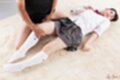 Kogal lying on her back wearing short skirt white socks
