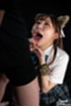 Kogal kneeling looking up giving handjob