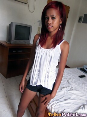 Skinny LBFM Jennelyn strips on bed and spreads her legs